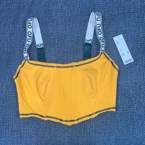 New corset style crop top from Urban Outfitters with tag. Orange-yellow color.